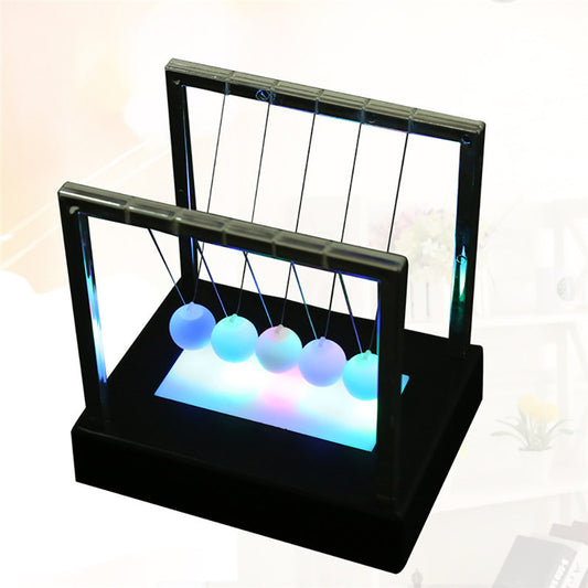 Luminous Newton's Cradle – A Soothing Light for Stress Relief